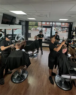 Advertise Your Business on Our 32-Inch Screen at Dilla Barbershop!